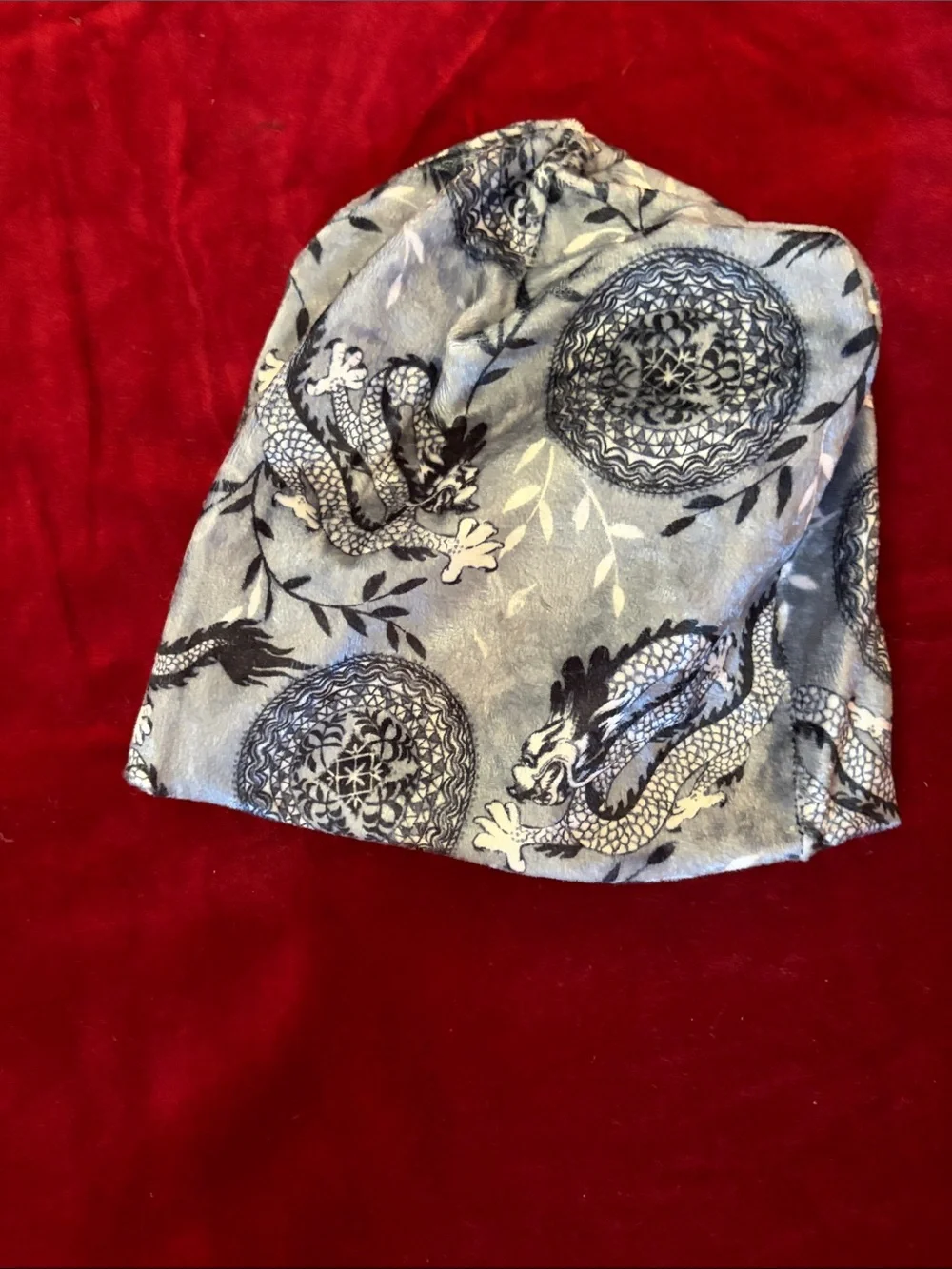 Red Velvet Reversible Blanket with dragon pattern matching beanie
